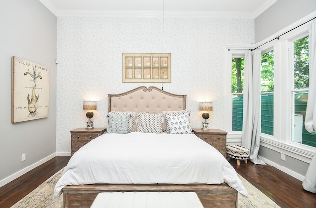 bedroom with dark wood-type flooring and ornamental molding