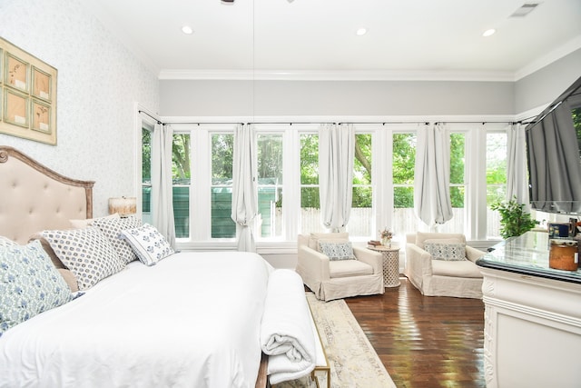 bedroom with ornamental molding and dark wood-type flooring