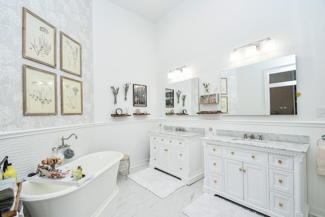 bathroom featuring a tub, tile patterned floors, and double sink vanity