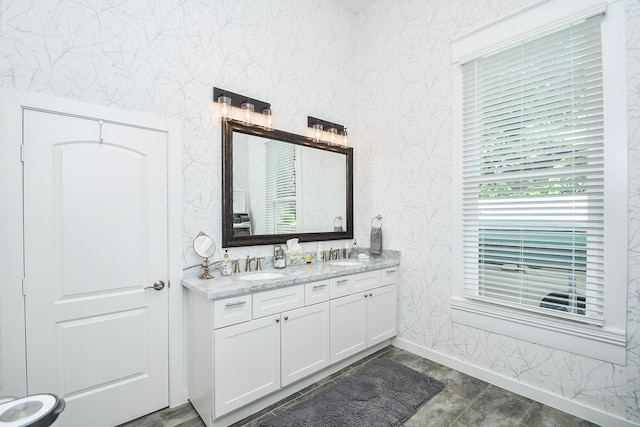 bathroom with dual bowl vanity