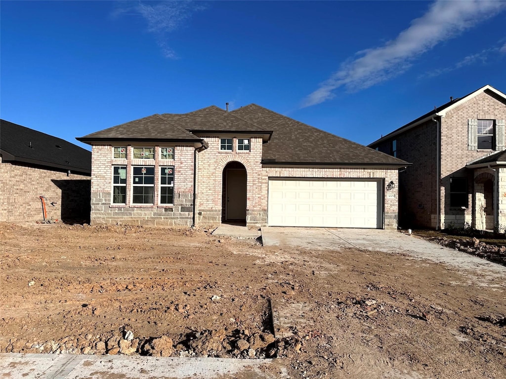 view of front of house with a garage