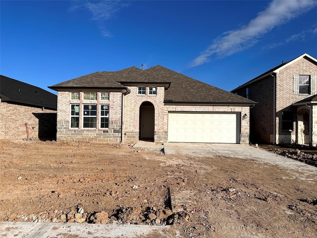 view of front of house with a garage