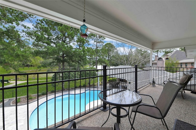 balcony featuring a patio area