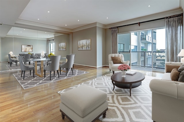 interior space with light wood-type flooring and ornamental molding