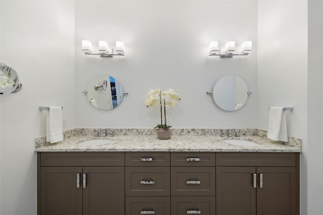 bathroom with dual bowl vanity