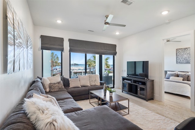 living room with ceiling fan