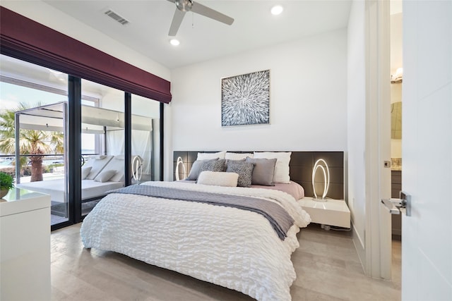 bedroom with access to outside, ensuite bathroom, light tile patterned floors, and ceiling fan