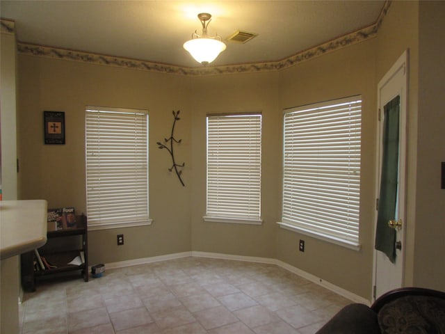 dining room with light tile patterned floors