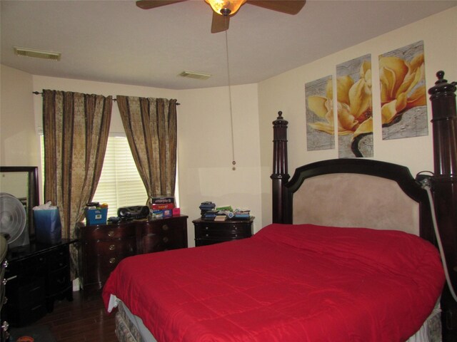 bedroom with hardwood / wood-style flooring and ceiling fan