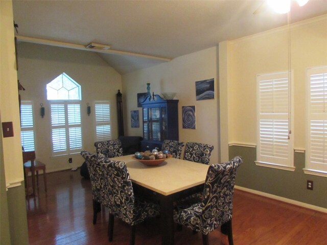 dining area with dark hardwood / wood-style flooring and ceiling fan