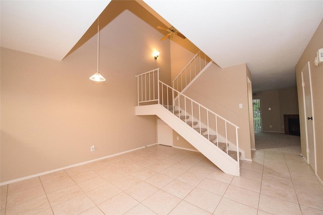 staircase with tile patterned flooring