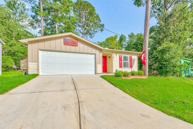 single story home with a garage, driveway, board and batten siding, and a front yard