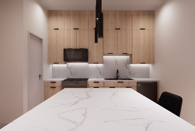 kitchen featuring light brown cabinetry, black appliances, and sink