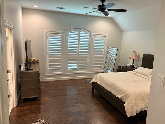 bedroom featuring lofted ceiling, ceiling fan, and dark hardwood / wood-style flooring