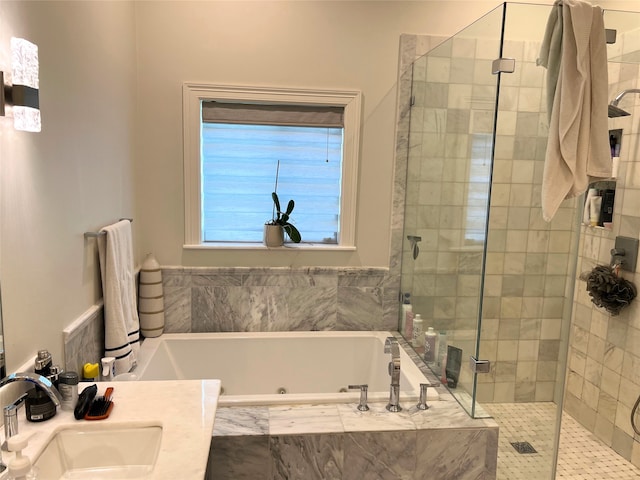 bathroom featuring separate shower and tub and vanity