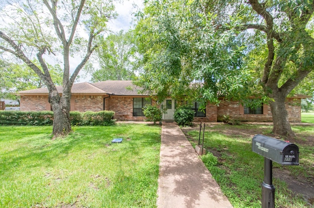 view of front of home with a front lawn