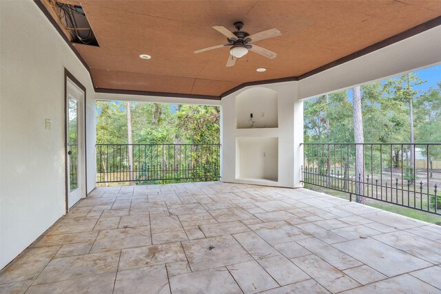 view of patio / terrace featuring a balcony and ceiling fan