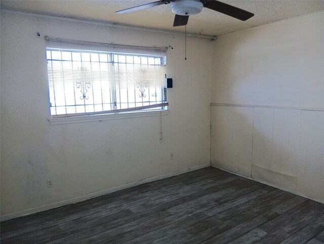 11807 Martin Luther King, Houston, TX 77048 - spare room with a ceiling fan, dark wood finished floors, and healthy amount of natural light