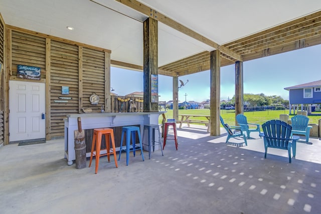 view of patio with outdoor dry bar