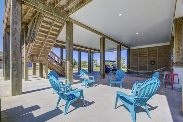 view of patio featuring stairway