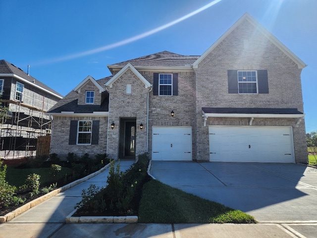 view of front of property with a garage