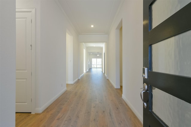9931 Hunters Run Dr, Missouri City, TX 77459 - hall with crown molding and light hardwood / wood-style flooring