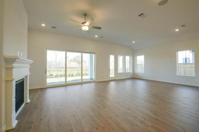 9931 Hunters Run Dr, Missouri City, TX 77459 - unfurnished living room featuring dark wood-type flooring and ceiling fan
