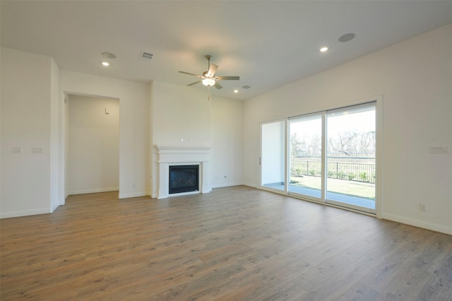 9931 Hunters Run Dr, Missouri City, TX 77459 - unfurnished living room with hardwood / wood-style floors and ceiling fan
