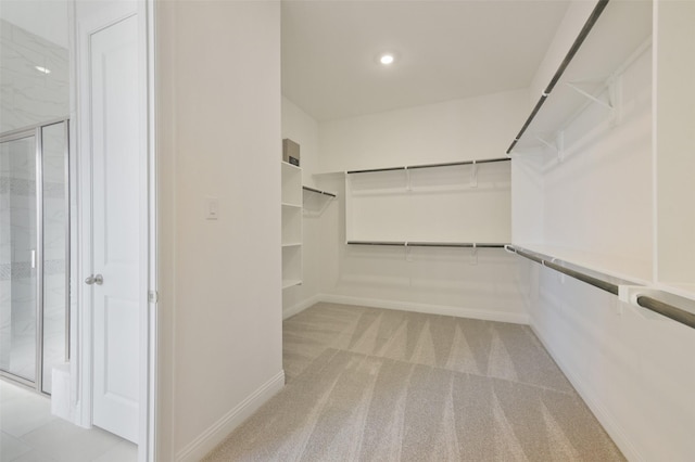 9931 Hunters Run Dr, Missouri City, TX 77459 - spacious closet with light colored carpet
