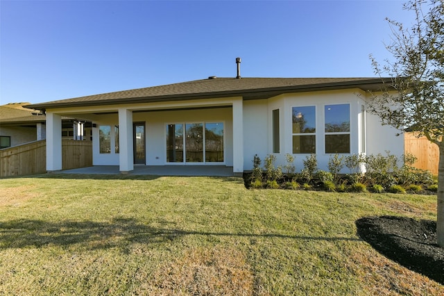 9931 Hunters Run Dr, Missouri City, TX 77459 - rear view of house with a yard and a patio