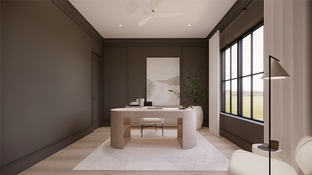 office area with ceiling fan, crown molding, and light hardwood / wood-style flooring