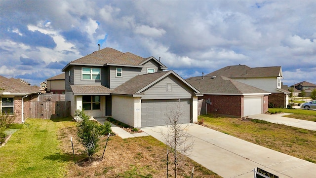 view of front facade with a front lawn and a garage