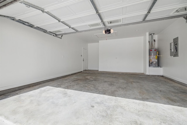 garage with gas water heater, a garage door opener, and electric panel