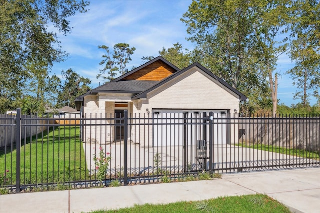 view of front facade featuring a garage and a front lawn