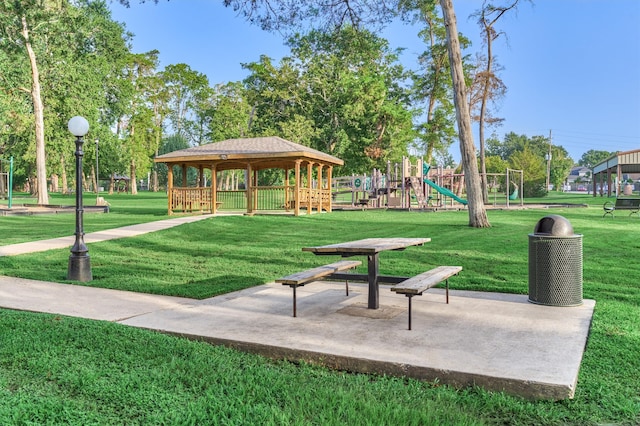 surrounding community with a playground and a lawn