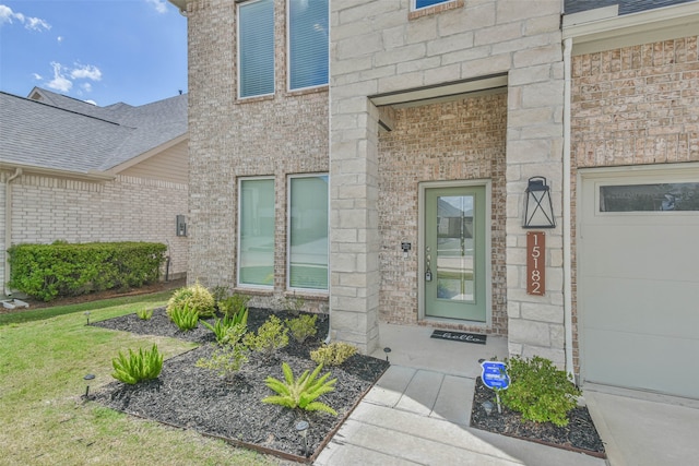 property entrance featuring a garage