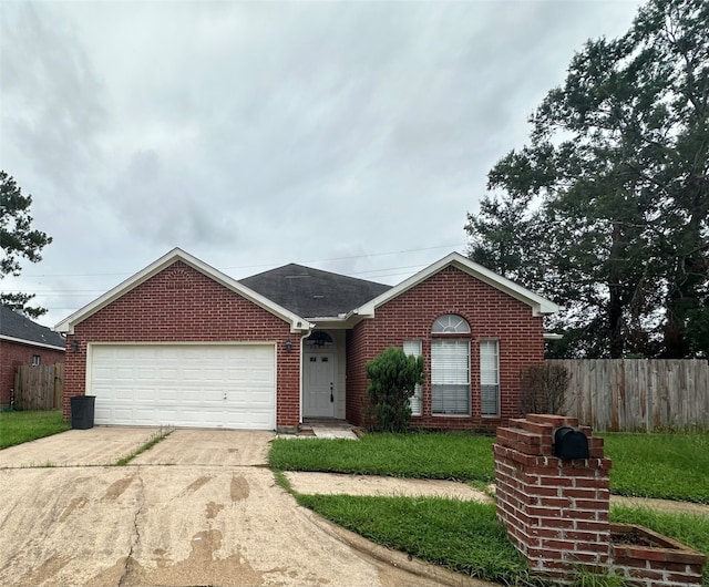 single story home featuring a garage