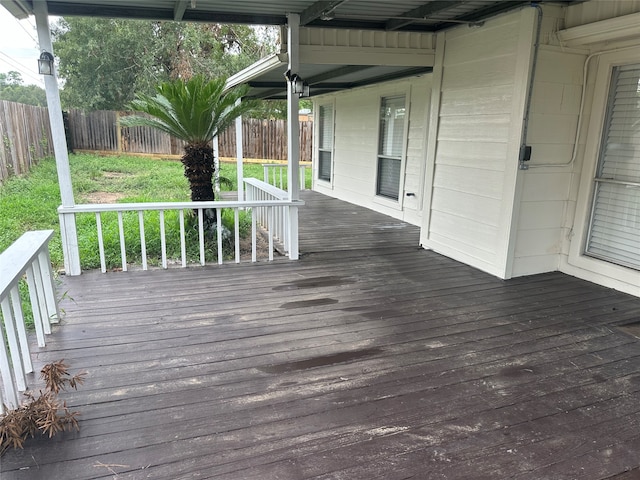 deck featuring a lawn