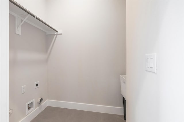 washroom featuring hookup for a washing machine, hookup for an electric dryer, and tile patterned flooring