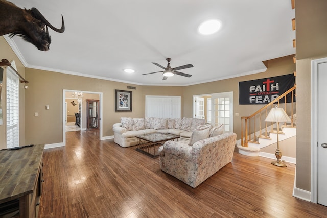 living room featuring ceiling fan, ornamental molding, french doors, and hardwood / wood-style flooring