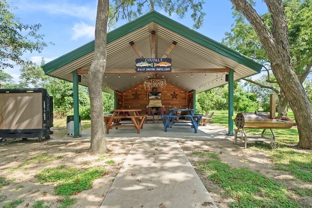 surrounding community featuring a patio and a gazebo