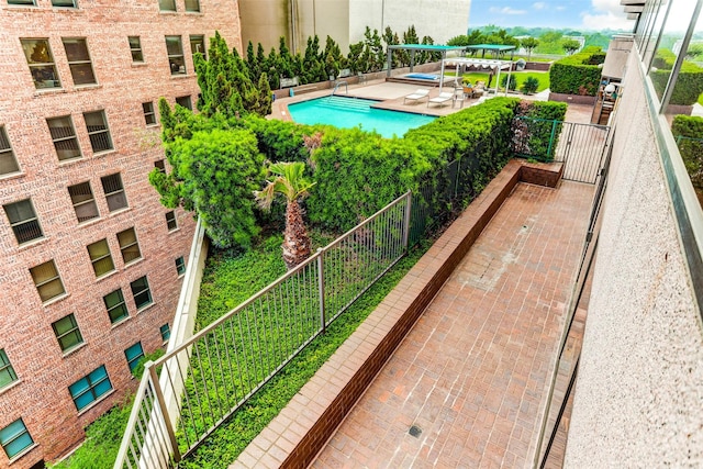 view of pool featuring a patio area and a pergola