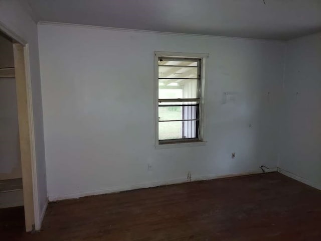 spare room featuring hardwood / wood-style flooring