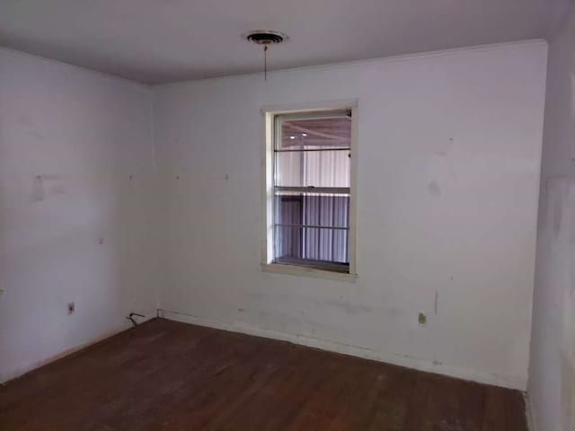 spare room featuring hardwood / wood-style floors