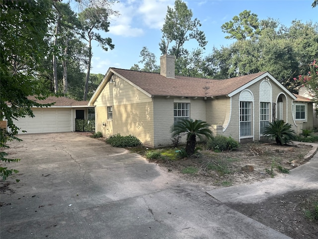 view of home's exterior with a garage