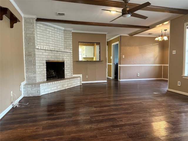 unfurnished living room featuring ornamental molding, a fireplace, ceiling fan with notable chandelier, and dark hardwood / wood-style floors