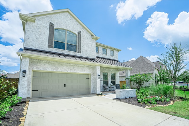 view of front of property featuring a garage