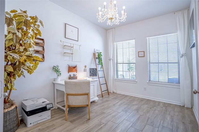 office featuring a notable chandelier and light wood-type flooring