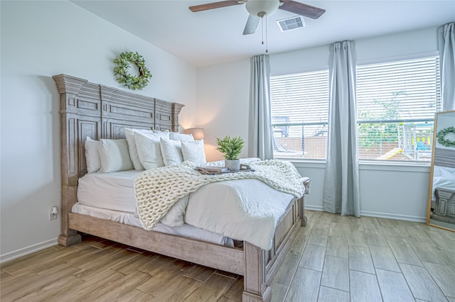 bedroom featuring ceiling fan and light wood-type flooring