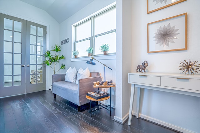 sitting room with vaulted ceiling, french doors, and hardwood / wood-style floors